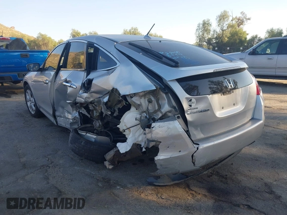 2010 Honda Crosstour EX-L z VIN 5J6TF1H59AL004799, wystawiony jako IAAI lot #41668347 z przebiegiem 214 195 mil mil oraz . Historia ofert i sprzedaży dostępna na DreamBid. Obrazek 3.