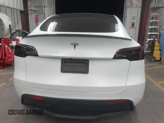 2023 Tesla Model Y Performance with VIN 7SAYGDEF5PF665560, listed as a IAAI auction lot 41809349 with Not Provided miles and . Bid and sale history available at DreamBid. Image 17.
