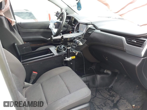 2020 Chevrolet Tahoe Commercial with VIN 1GNLCDEC7LR199179, listed as a IAAI auction lot 41502623 with 87,271 mi miles and . Bid and sale history available at DreamBid. Image 5.