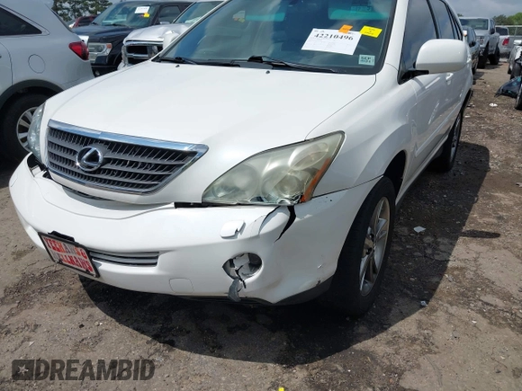 2006 Lexus RX 400h z VIN JTJHW31U560039824, wystawiony jako IAAI lot #42210496 z przebiegiem 189 999 mil mil oraz . Historia ofert i sprzedaży dostępna na DreamBid. Obrazek 6.