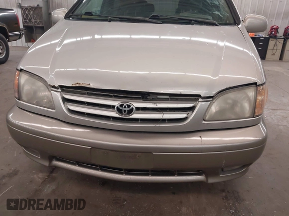 2001 Toyota Sienna LE z VIN 4T3ZF13C31U324428, wystawiony jako IAAI lot #42238030 z przebiegiem 209 762 mil mil oraz . Historia ofert i sprzedaży dostępna na DreamBid. Obrazek 13.