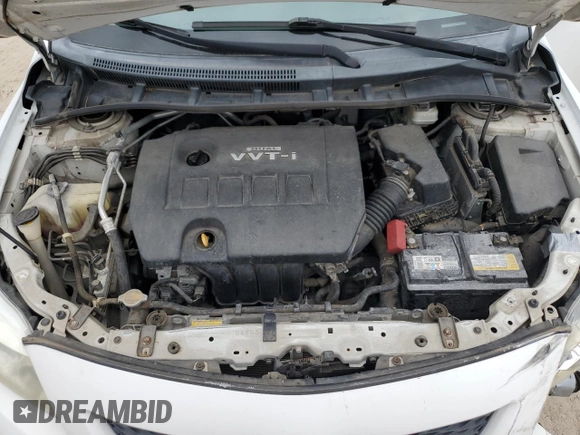 2010 Toyota Corolla with VIN 1NXBU4EE7AZ256666, listed as a Copart auction lot 79097074 with 65,537 mi miles and Salvage title. Bid and sale history available at DreamBid. Image 12.