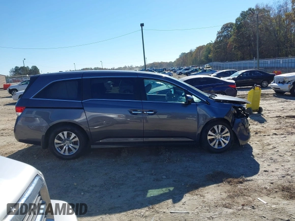 2016 Honda Odyssey EX-L with VIN 5FNRL5H69GB047902, listed as a IAAI auction lot 40795564 with 124,788 mi miles. Bid and sale history available at carsss.com. Image 13.