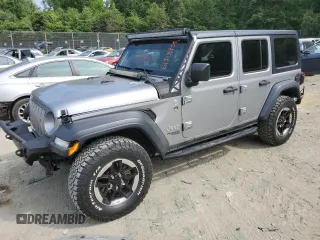 2020 Jeep Wrangler Unlimited Sport with VIN 1C4HJXDM5LW208799, listed as a Copart auction lot 61701954 with 33,873 mi miles and Salvage title. Bid and sale history available at DreamBid. Image 1.