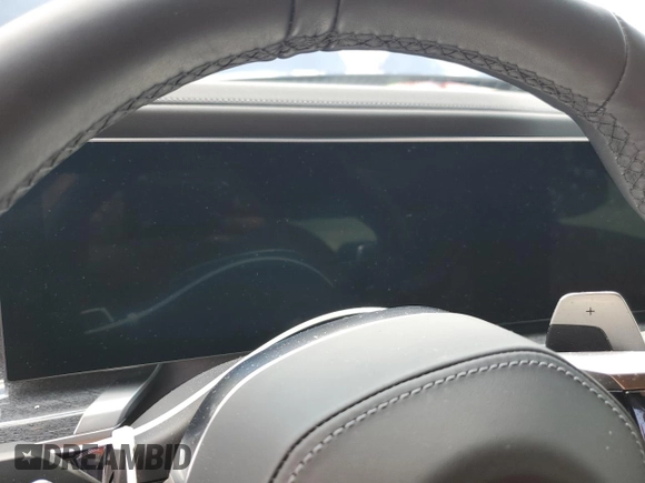 2024 BMW 7 Series 740i z VIN WBA23EH00RCP83346, wystawiony jako Copart lot #74360314 z przebiegiem Nie podano mil oraz Nie do naprawy • Non repairable. Historia ofert i sprzedaży dostępna na DreamBid. Obrazek 9.
