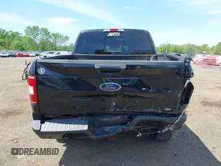 2018 Ford F-150 XL with VIN 1FTEW1EG0JFB61382, listed as a IAAI auction lot 42231412 with 101,376 mi miles and . Bid and sale history available at DreamBid. Image 16.