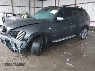 2011 BMW X5 50i with VIN 5UXZV8C59BL419527, listed as a IAAI auction lot 42173425 with 185,802 mi miles and . Bid and sale history available at DreamBid. Image 2.