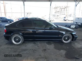 1996 BMW 3-Series 318TI with VIN WBACG8324TAU38424, listed as a IAAI auction lot 41529537 with 160,199 mi miles. Bid and sale history available at carsss.com. Image 13.