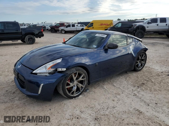 2013 Nissan 370Z with VIN JN1AZ4EH6DM880252, listed as a Copart auction lot 70528464 with 63,111 mi miles and Salvage Title. Bid and sale history available at carsss.com. Image 1.