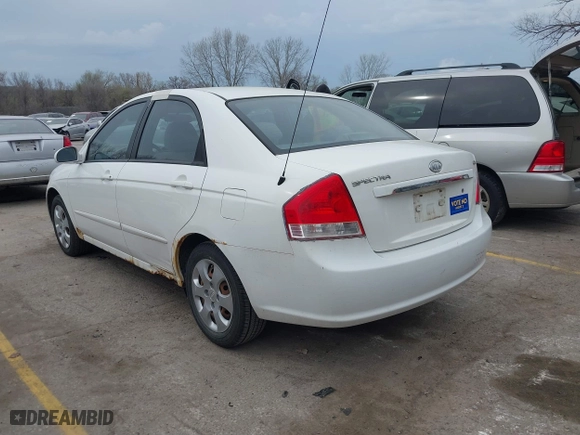 2007 Kia Spectra EX with VIN KNAFE121875393392, listed as a IAAI auction lot 41893653 with 158,913 mi miles. Bid and sale history available at carsss.com. Image 3.