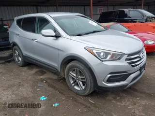 2018 Hyundai Santa Fe 2.4L z VIN 5XYZTDLB8JG559617, wystawiony jako IAAI lot #41491972 z przebiegiem 159 854 mil mil oraz . Historia ofert i sprzedaży dostępna na DreamBid. Obrazek 1.
