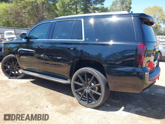 2020 Chevrolet Tahoe LT with VIN 1GNSKBKC7LR159742, listed as a IAAI auction lot 41854694 with 112,087 mi miles and . Bid and sale history available at DreamBid. Image 3.