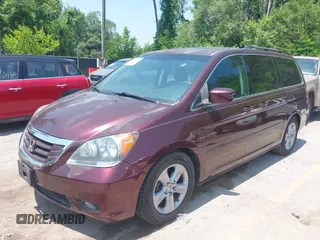 2010 Honda Odyssey Touring z VIN 5FNRL3H92AB010292, wystawiony jako IAAI lot #42469216 z przebiegiem 188 921 mil mil oraz . Historia ofert i sprzedaży dostępna na DreamBid. Obrazek 2.