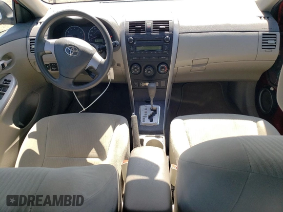 2010 Toyota Corolla with VIN 1NXBU4EE2AZ275061, listed as a Copart auction lot 52596765 with 113,833 mi miles and Salvage Title. Bid and sale history available at DreamBid. Image 8.