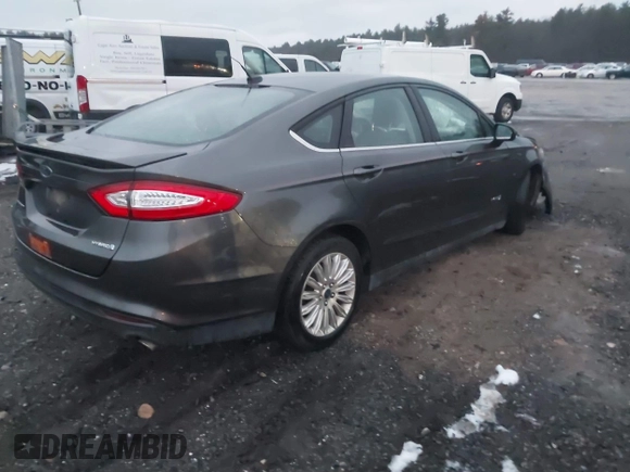 2015 Ford Fusion S Hybrid with VIN 3FA6P0UU2FR102241, listed as a IAAI auction lot 41003479 with 88,020 mi miles. Bid and sale history available at carsss.com. Image 4.