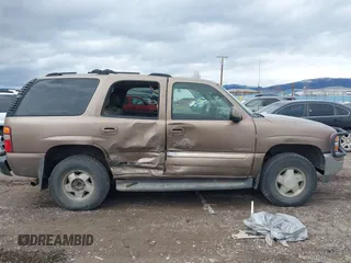 2003 GMC Yukon SLT z VIN 1GKEK13Z93R211332, wystawiony jako IAAI lot #41739150 z przebiegiem Nie podano mil oraz . Historia ofert i sprzedaży dostępna na DreamBid. Obrazek 13.
