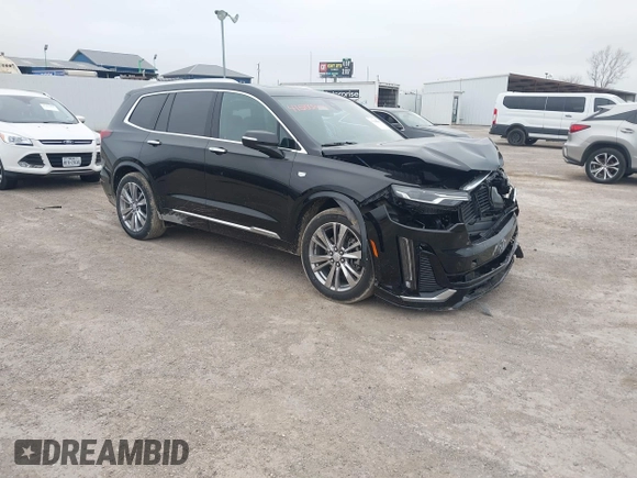 2023 Cadillac XT6 FWD Premium Luxury with VIN 1GYKPCRS8PZ231089, listed as a IAAI auction lot 41500954 with 36,455 mi miles and . Bid and sale history available at DreamBid. Image 1.