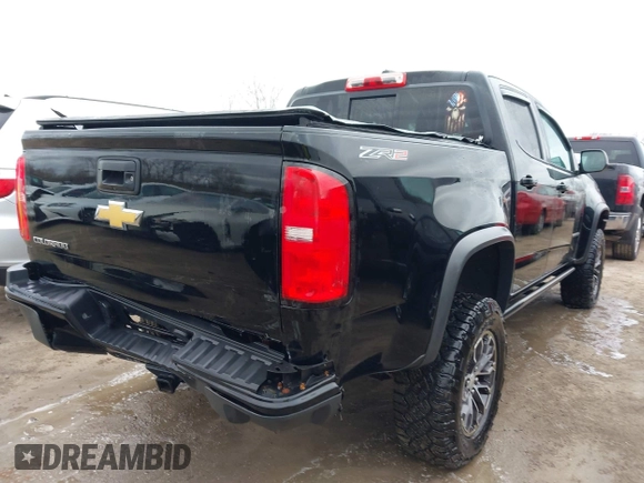 2018 Chevrolet Colorado 4WD ZR2 with VIN 1GCGTEEN9J1173647, listed as a IAAI auction lot 42016015 with 102,041 mi miles. Bid and sale history available at carsss.com. Image 4.