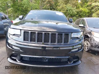 2014 Jeep Grand Cherokee SRT-8 z VIN 1C4RJFDJ2EC174412, wystawiony jako IAAI lot #42116541 z przebiegiem 124 693 mil mil oraz . Historia ofert i sprzedaży dostępna na DreamBid. Obrazek 12.