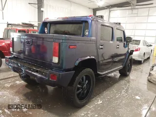 2006 Hummer H2 z VIN 5GRGN22U06H103603, wystawiony jako IAAI lot #41992767 z przebiegiem 165 782 mil mil oraz . Historia ofert i sprzedaży dostępna na DreamBid. Obrazek 4.