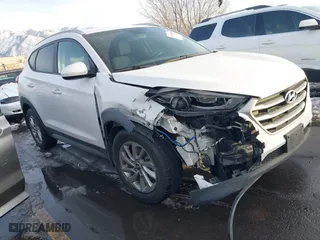 2017 Hyundai Tucson SE Plus with VIN KM8J33A44HU352769, listed as a IAAI auction lot 41106280 with 117,809 mi miles. Bid and sale history available at carsss.com. Image 1.