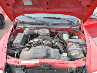 2003 Dodge Dakota SLT with VIN 1D7HL42X43S247404, listed as a IAAI auction lot 41685036 with 95,054 mi miles. Bid and sale history available at carsss.com. Image 10.