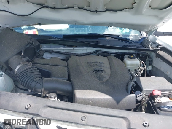2020 Toyota Tacoma SR5 z VIN 5TFCZ5AN5LX231157, wystawiony jako IAAI lot #42045534 z przebiegiem 84 099 mil mil oraz . Historia ofert i sprzedaży dostępna na DreamBid. Obrazek 10.