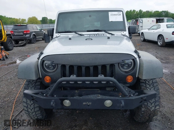 2007 Jeep Wrangler Unlimited X with VIN 1J4GA39187L209448, listed as a IAAI auction lot 42104328 with 138,302 mi miles and . Bid and sale history available at DreamBid. Image 12.