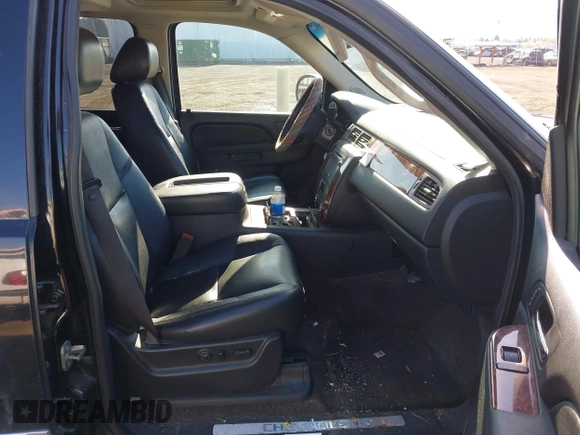 2012 Chevrolet Suburban LTZ with VIN 1GNSKKE74CR324578, listed as a IAAI auction lot 42129334 with 182,655 mi miles. Bid and sale history available at carsss.com. Image 5.