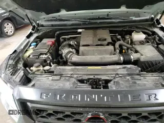 2023 Nissan Frontier SV with VIN 1N6ED1EKXPN665251, listed as a Copart auction lot 64623895 with 23,384 mi miles and Salvage title. Bid and sale history available at DreamBid. Image 13.