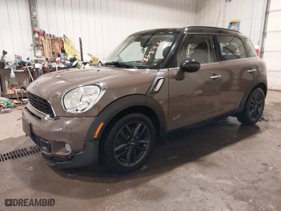 2013 MINI Cooper Countryman S ALL4 with VIN WMWZC5C51DWP34732, listed as a IAAI auction lot 41381536 with 148,475 mi miles. Bid and sale history available at carsss.com. Image 17.