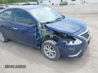 2019 Nissan Versa SV z VIN 3N1CN7AP7KL809443, wystawiony jako IAAI lot #42216308 z przebiegiem 101 860 mil mil oraz . Historia ofert i sprzedaży dostępna na DreamBid. Obrazek 6.