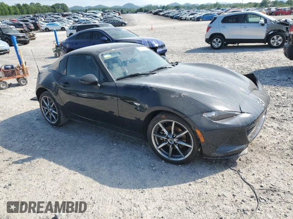 2021 Mazda MX-5 Miata Grand Touring with VIN JM1NDAM7XM0456083, listed as a Copart auction lot 52894705 with 86,050 mi miles and Salvage title. Bid and sale history available at DreamBid. Image 4.