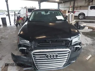 2012 Audi A8 with VIN WAUAVAFD9CN006499, listed as a IAAI auction lot 42461402 with 57,232 mi miles and . Bid and sale history available at DreamBid. Image 12.