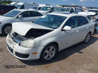 2008 Volkswagen Jetta SE with VIN 3VWRM71K28M107318, listed as a IAAI auction lot 42683783 with 144,686 mi miles and . Bid and sale history available at DreamBid. Image 2.