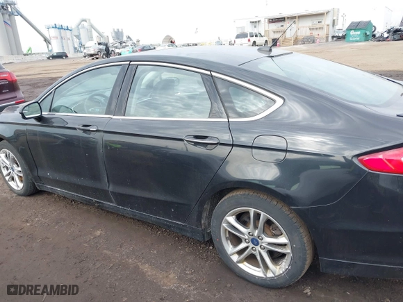 2015 Ford Fusion Titanium Hybrid with VIN 3FA6P0RU6FR299374, listed as a IAAI auction lot 41576007 with 191,285 mi miles. Bid and sale history available at carsss.com. Image 14.