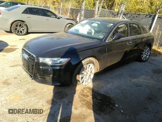 2014 Audi A6 Premium Plus z VIN WAUGFAFC7EN042581, wystawiony jako IAAI lot #34712557 z przebiegiem Nie podano mil oraz . Historia ofert i sprzedaży dostępna na DreamBid. Obrazek 2.