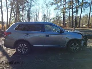2020 Mitsubishi Outlander ES with VIN JA4AZ3A31LZ041204, listed as a IAAI auction lot 41265645 with 98,372 mi miles and . Bid and sale history available at DreamBid. Image 14.