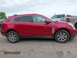 2016 Cadillac SRX Premium Collection z VIN 3GYFNDE37GS525186, wystawiony jako IAAI lot #42179497 z przebiegiem 117 200 mil mil oraz . Historia ofert i sprzedaży dostępna na DreamBid. Obrazek 13.