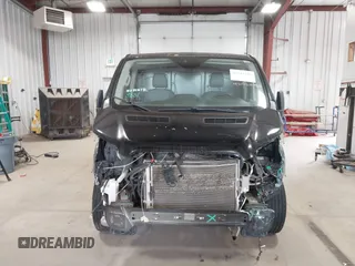 2018 Ford Transit with VIN 1FTYE1YM6JKA38498, listed as a IAAI auction lot 42522740 with 117,220 mi miles and . Bid and sale history available at DreamBid. Image 12.