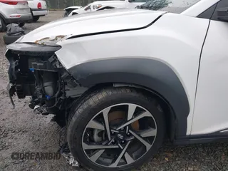 2022 Hyundai Kona Limited with VIN KM8K5CA3XNU811739, listed as a IAAI auction lot 41271588 with 50,007 mi miles and . Bid and sale history available at DreamBid. Image 6.