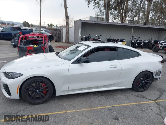 2022 BMW 4 Series 430i with VIN WBA53AP02NCK91287, listed as a IAAI auction lot 41448686 with 27,046 mi miles and . Bid and sale history available at carsss.com. Image 15.