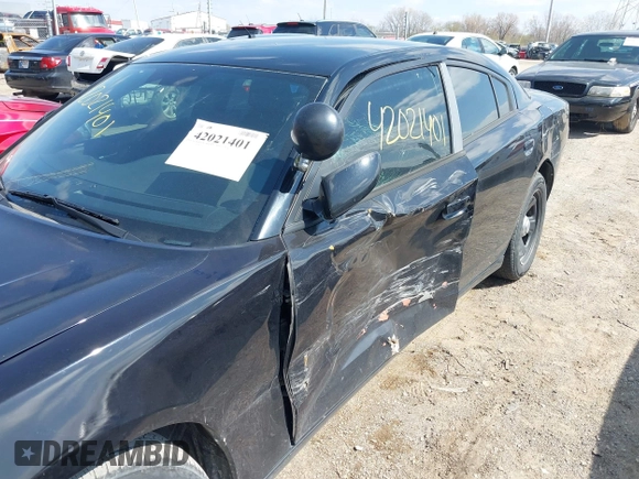2013 Dodge Charger Police with VIN 2C3CDXAG5DH546384, listed as a IAAI auction lot 42021401 with 154,637 mi miles and . Bid and sale history available at carsss.com. Image 12.