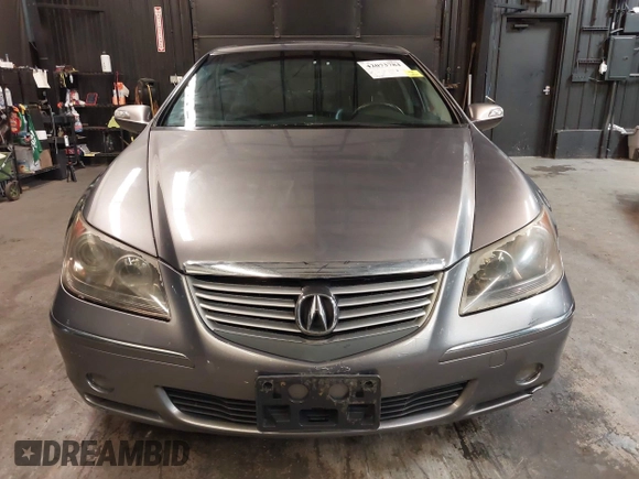 2006 Acura RL z VIN JH4KB165X6C009547, wystawiony jako IAAI lot #42073784 z przebiegiem 190 601 mil mil oraz . Historia ofert i sprzedaży dostępna na DreamBid. Obrazek 6.