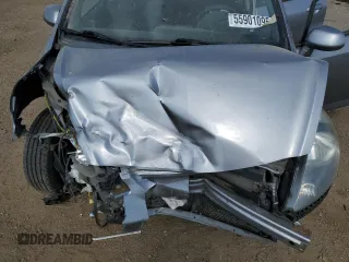 2007 Honda Fit z VIN JHMGD38497S025472, wystawiony jako Copart lot #55901095 z przebiegiem 120 216 mil mil oraz Szkoda całkowita • Salvage title. Historia ofert i sprzedaży dostępna na DreamBid. Obrazek 11.