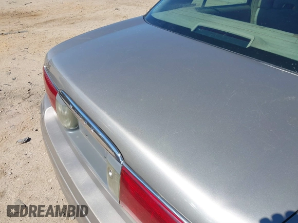 2003 Buick LeSabre Custom with VIN 1G4HP52K53U103689, listed as a IAAI auction lot 41831564 with 211,663 mi miles. Bid and sale history available at carsss.com. Image 12.