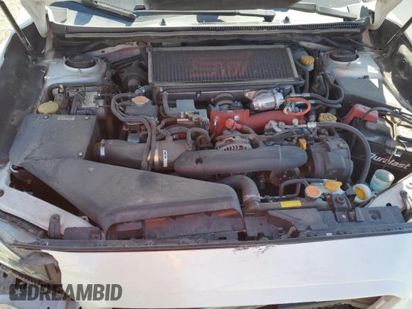 2015 Subaru WRX STI z VIN JF1VA2L64F9801006, wystawiony jako Copart lot #76352084 z przebiegiem 83 496 mil mil oraz Szkoda całkowita • Salvage title. Historia ofert i sprzedaży dostępna na DreamBid. Obrazek 12.