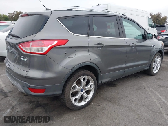 2013 Ford Escape Titanium with VIN 1FMCU0J9XDUD86354, listed as a IAAI auction lot 42420780 with 260,995 mi miles and . Bid and sale history available at DreamBid. Image 4.