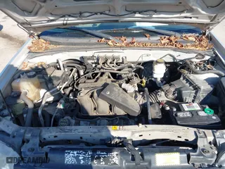 2006 Ford Escape XLT with VIN 1FMCU03166KB47650, listed as a IAAI auction lot 41529751 with 153,962 mi miles. Bid and sale history available at carsss.com. Image 10.
