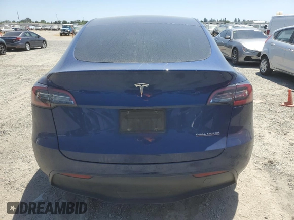 2022 Tesla Model Y Performance z VIN 7SAYGDEF6NF337710, wystawiony jako Copart lot #60200985 z przebiegiem 101 168 mil mil oraz Szkoda całkowita • Salvage title. Historia ofert i sprzedaży dostępna na DreamBid. Obrazek 6.
